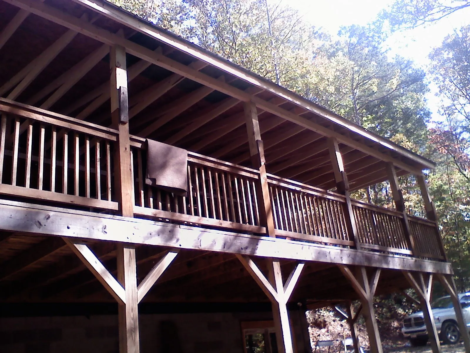 Timber framing under a new elevated porch and deck — Roof Leak Repair in Mears by Roofing Brothers